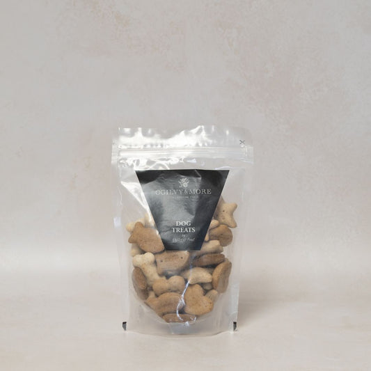 Bag of Ogilvy & More dog treats with a visible brand label on a white background