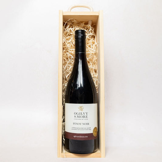 Bottle of Ogilvy & More Pinot Noir wine in a smart wooden gift box