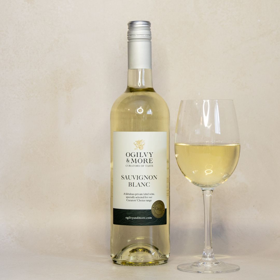 Bottle of Ogilvy & More Sauvignon Blanc with a glass of wine