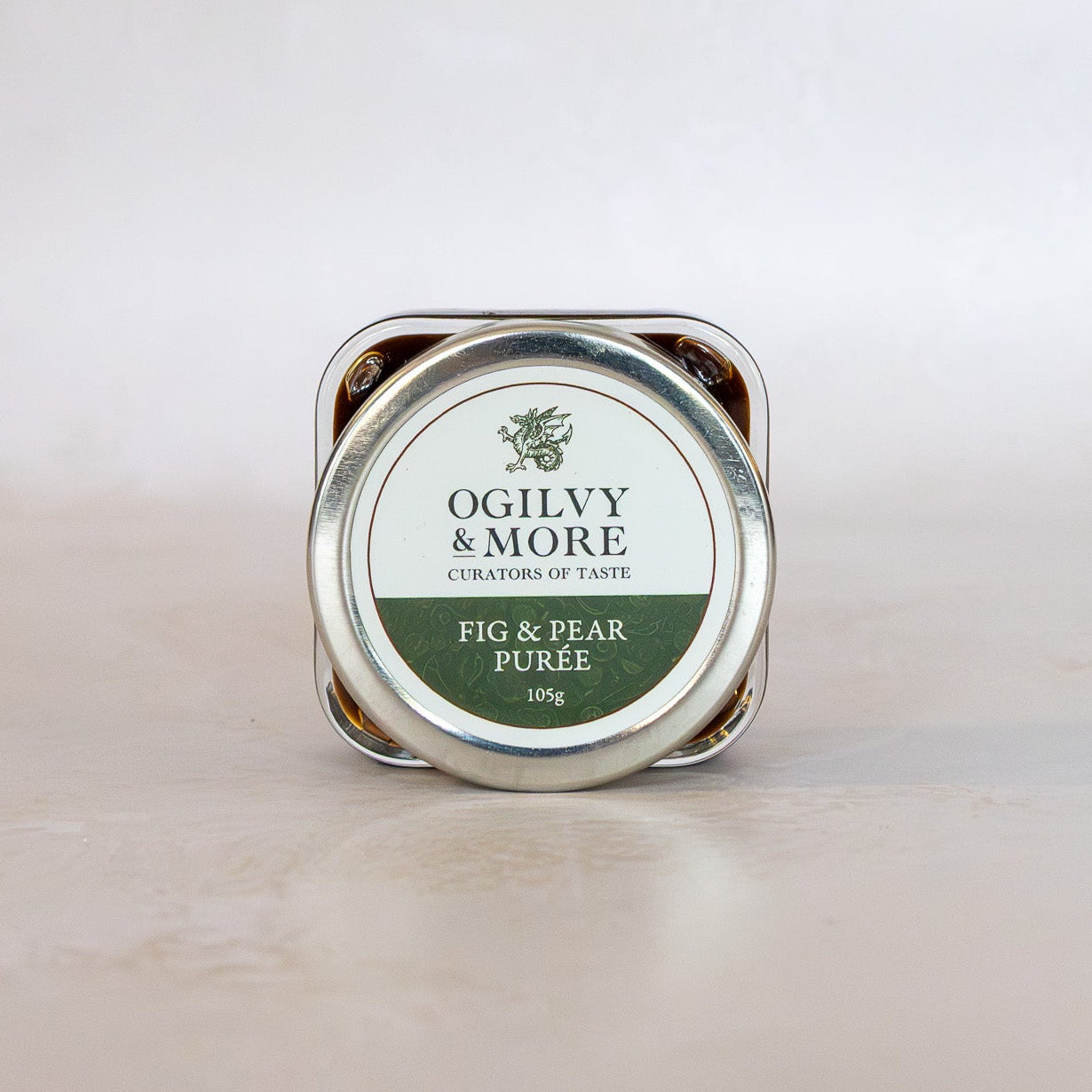 Jar of Ogilvy & More Fig & Pear Puree on a light background