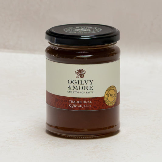 Jar of Ogilvy & More Quince Jelly on a white background