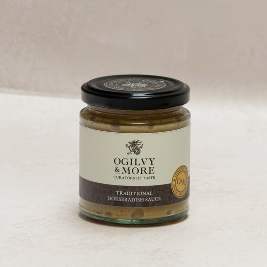 Jar of Ogilvy & More horseradish sauce on a white background