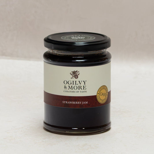 Jar of Ogilvy & More strawberry jam on a light background