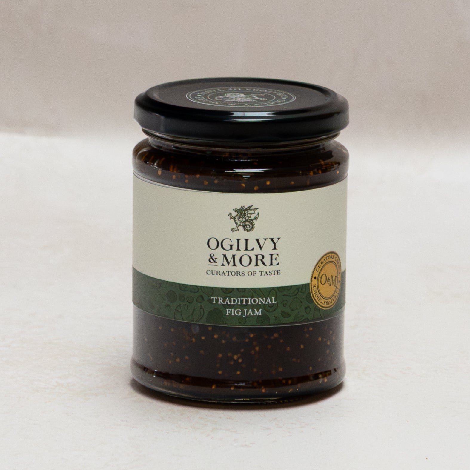 Jar of Ogilvy & More traditional fig jam on a white background