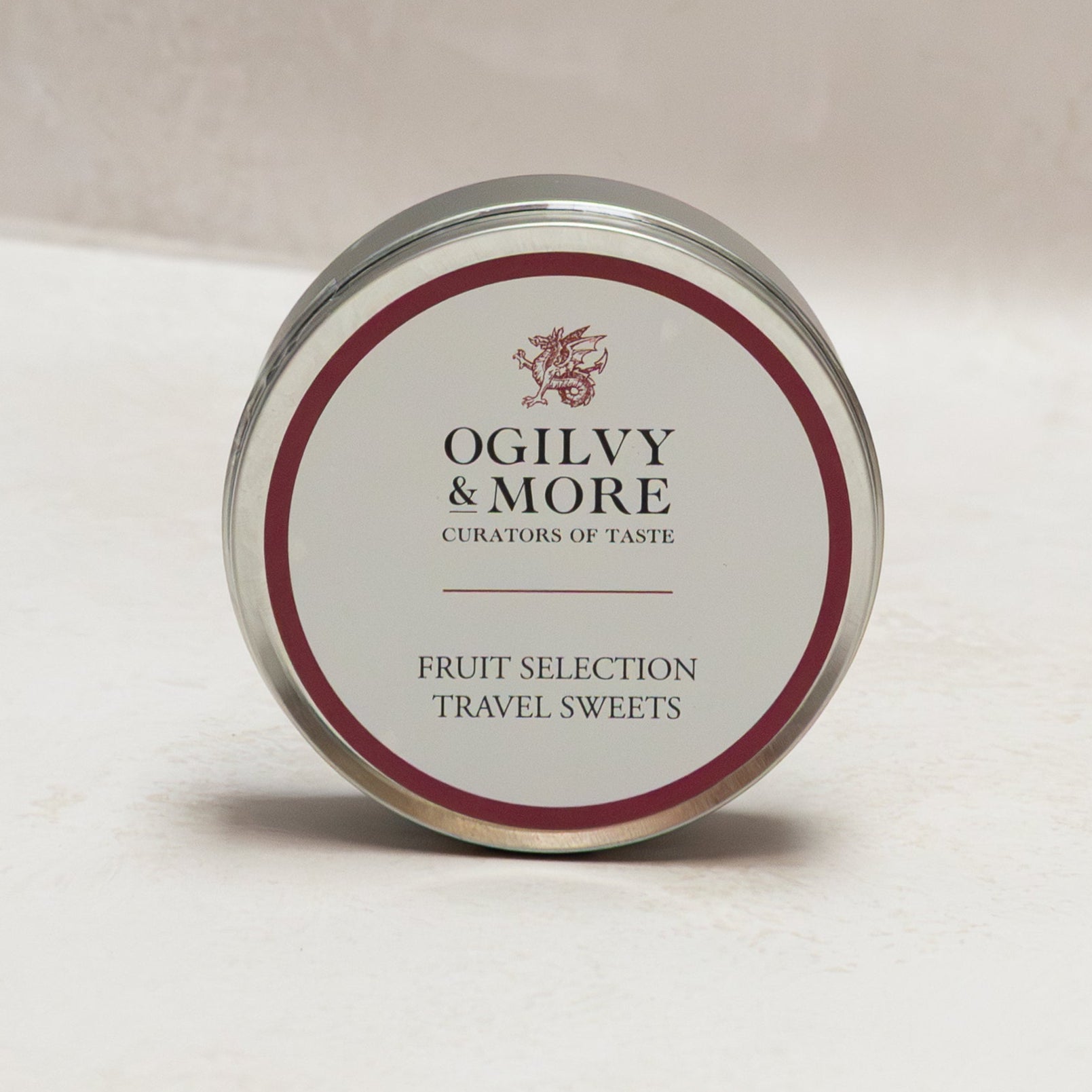 Ogilvy & More travel sweets tin on a light background