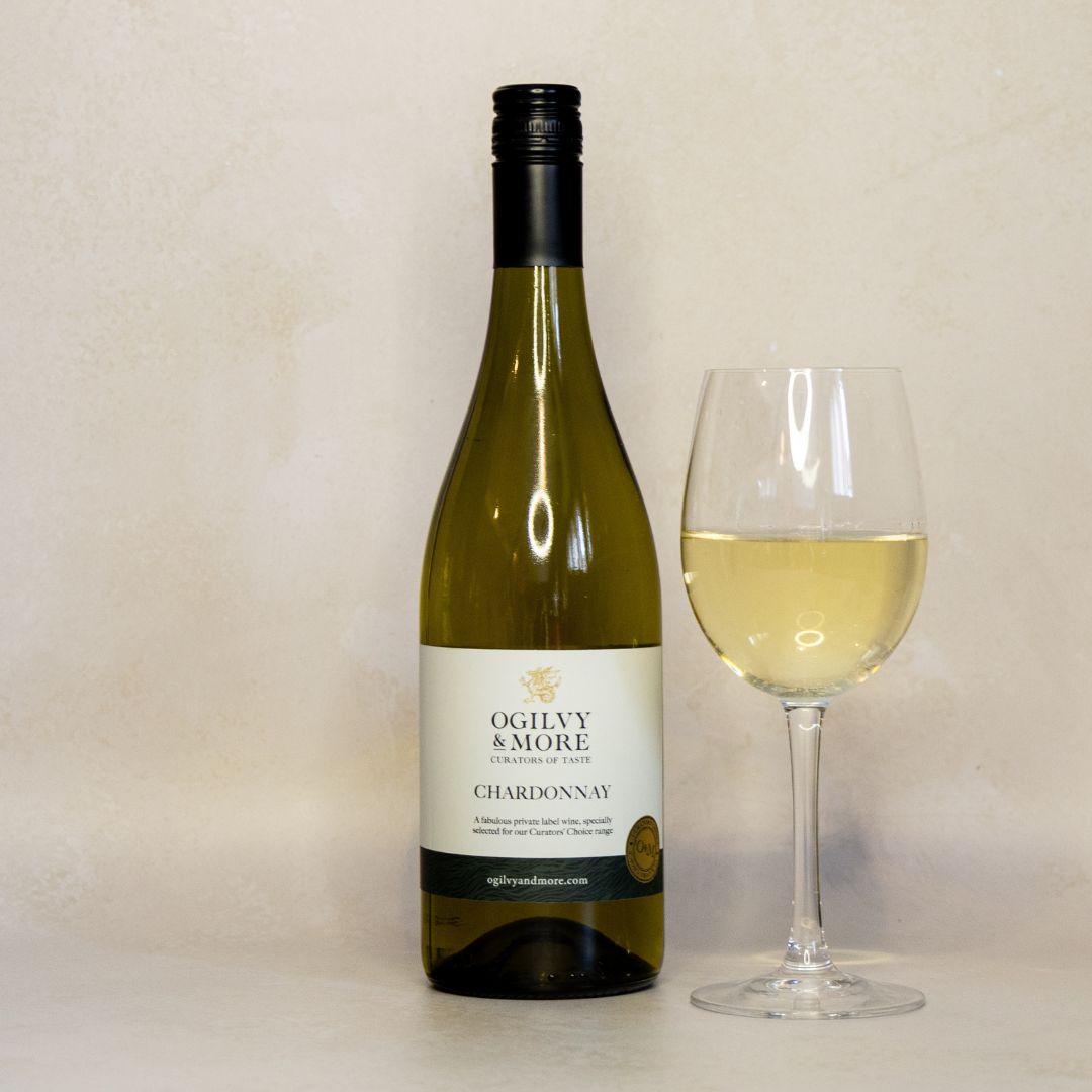 Ogilvy & More Chardonnay wine bottle with glass