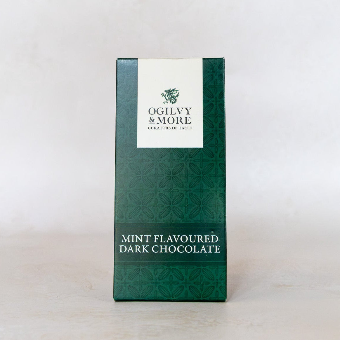 Mint chocolate with 'Ogilvy & More' branding on a white background