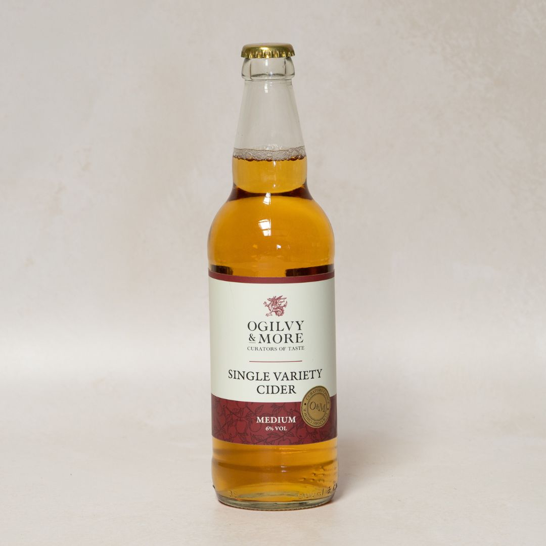 Bottle of Ogilvy & More Single Variety Cider on a white background