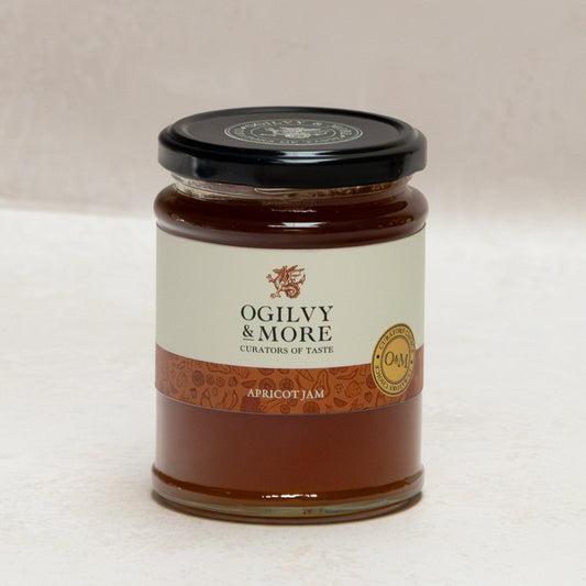 Jar of Ogilvy & More apricot jam on a white background