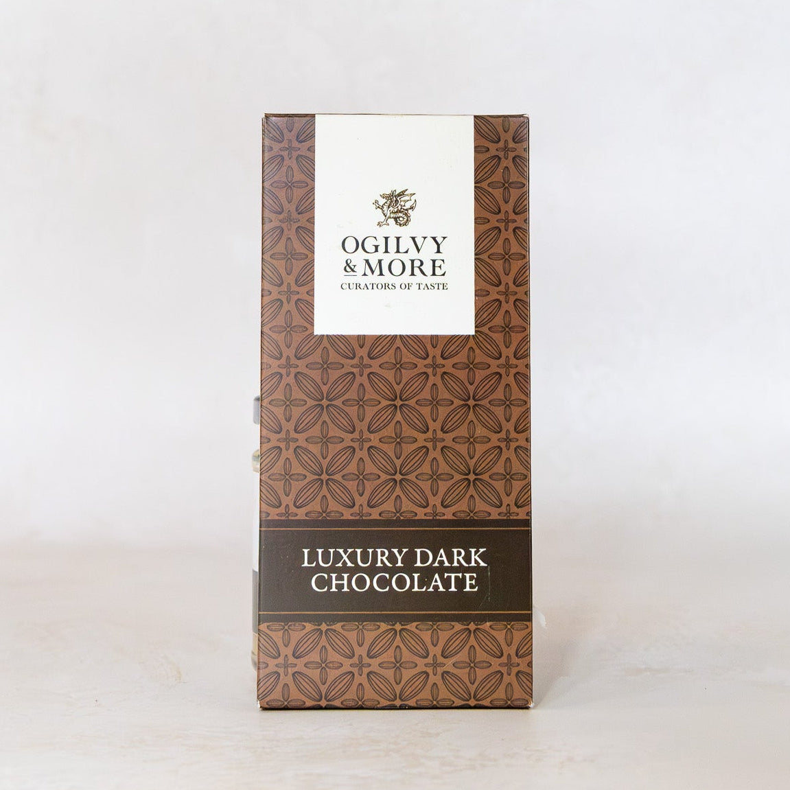 Box of Ogilvy & More luxury dark chocolate on a white background