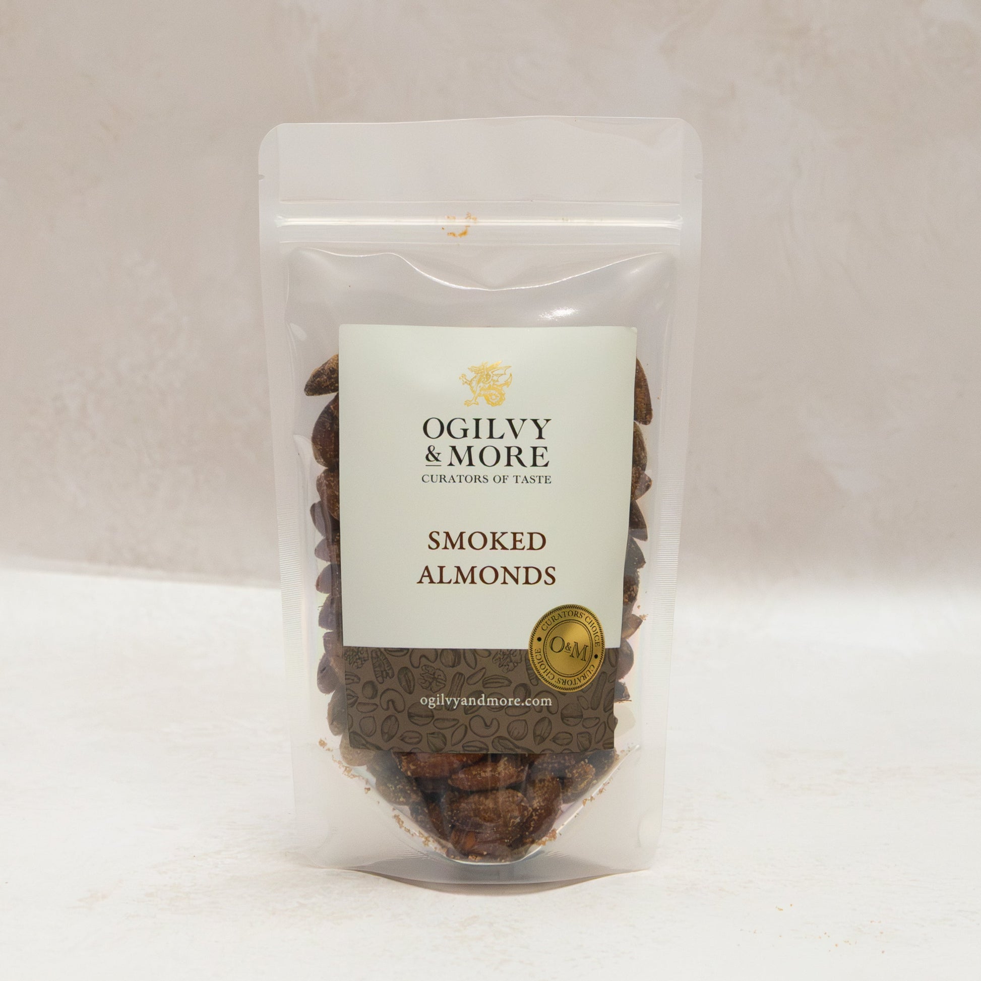 Ogilvy & More smoked almonds with a visible brand label on a plain background