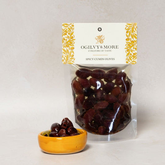 Ogilvy & More spicy cumin olives with a visible brand label on a neutral background
