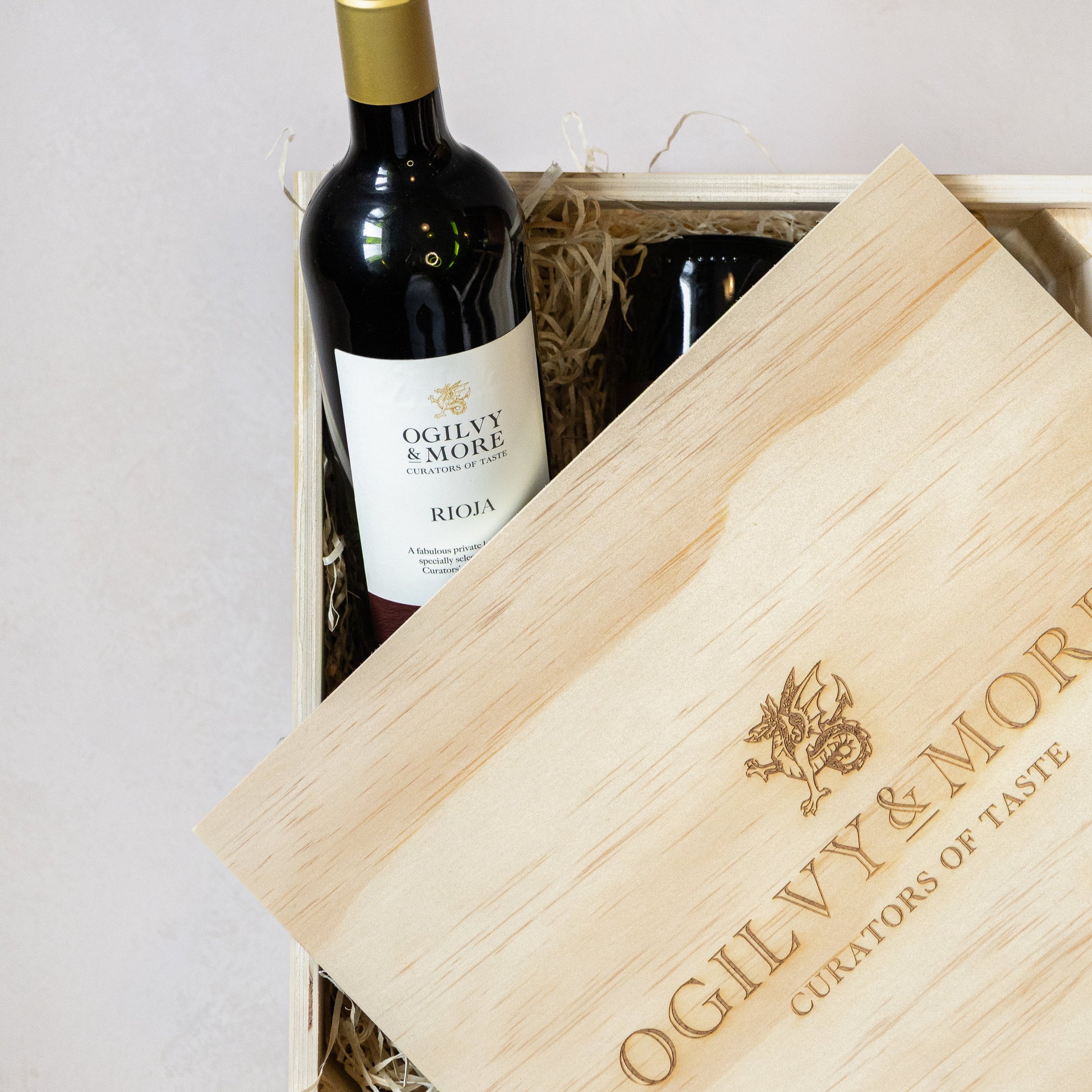 Ogilvy & Morle Rioja wine in a wooden box with the brand name visible.