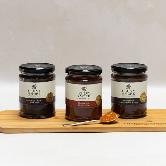Three jars of Ogilvy & Jam and Chutney on a wooden board with a white background