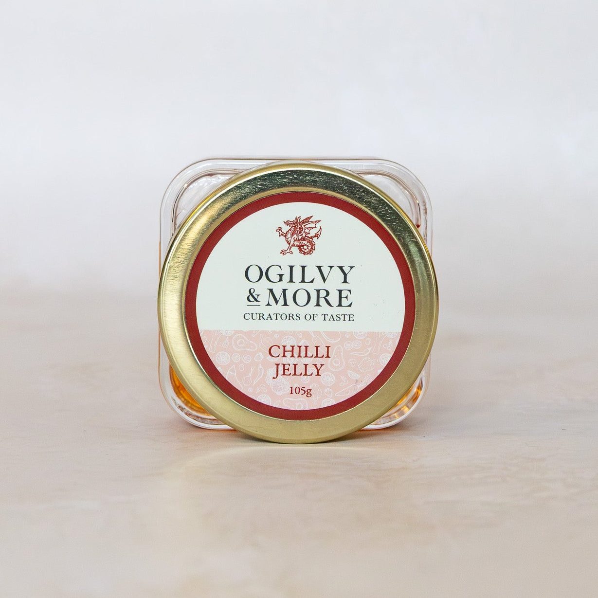 Jar of Ogilvy & More Chilli Jelly on a white background
