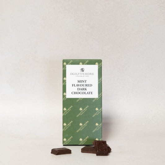 Packet of Ogilvy & More mint flavoured dark chocolate on a light gray background