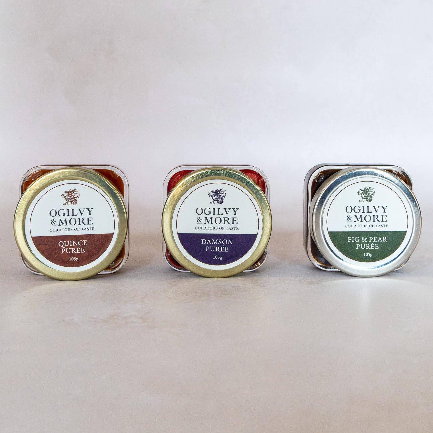 Three jars of Ogilvy & More purees on a light background