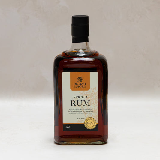Bottle of Ogilvy & More spiced rum on a white background
