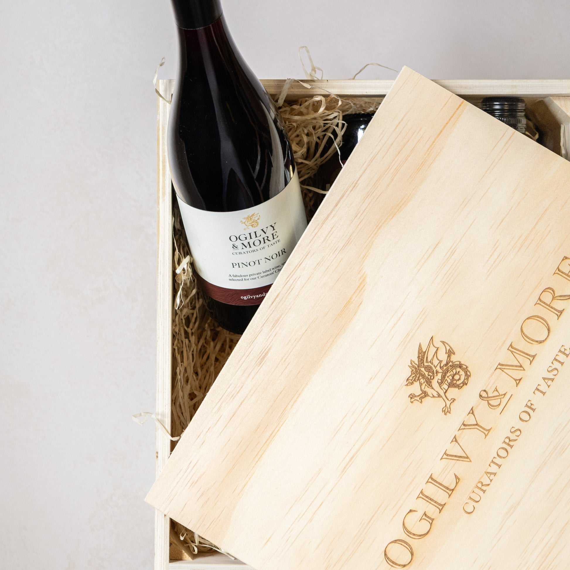 Ogilvy and More Pinot noir bottle in a wooden crate 