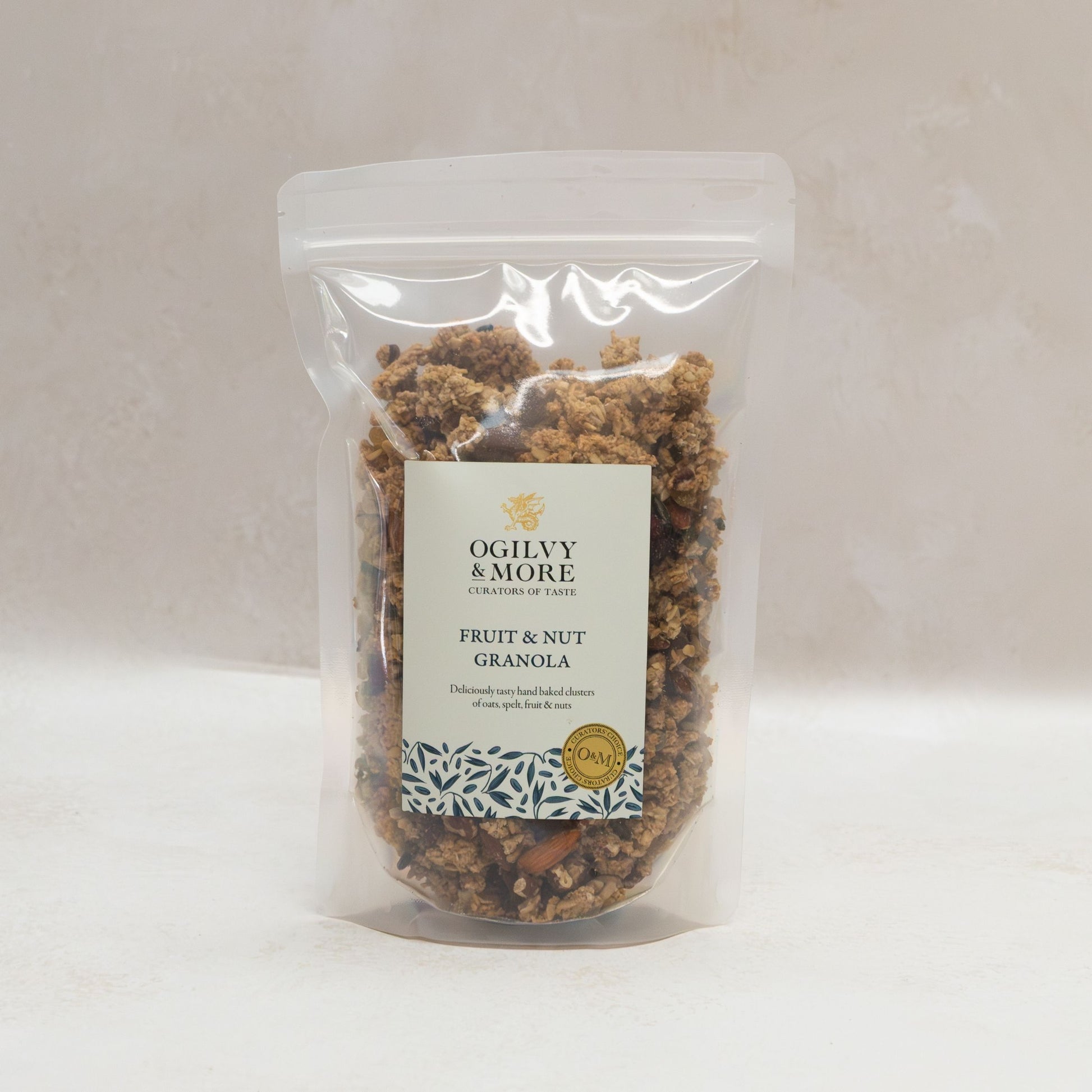 Packaged fruit and nut granola with a visible label on a plain background
