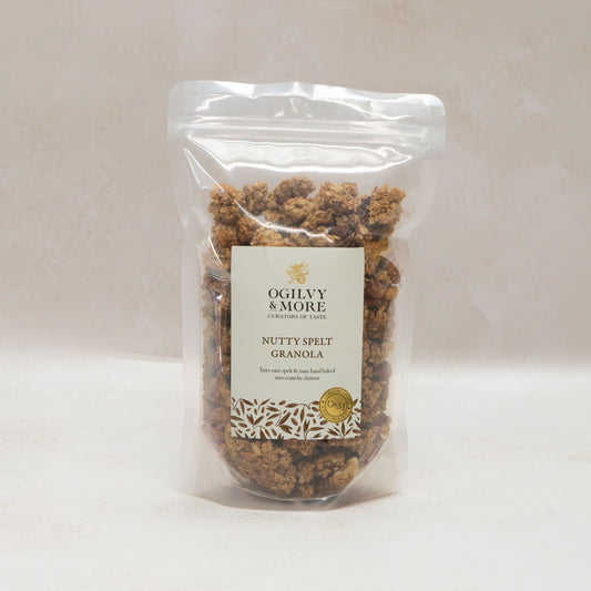 Packaged nutty spelt granola with Ogilvy & More label on a white background